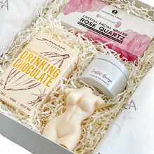 Load image into Gallery viewer, Indulge Gift Hamper. Rose quartz facial roller. Exquisite drinking chocolate. Soy tin candle hand poured in Melbourne. Sustainable wax, vegan and cruelty free. Available in Coastal breeze or French Pear randomly selected. 7.5cm in diameter.  Female torso candle, approximately 11 centimetres tall. Ideal for use as a centre piece or home decor.  Hand made in Sydney, unscented natural soy wax blend
