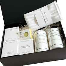 Load image into Gallery viewer, Black magnetic gift box with premium reed diffuser, soap bar, hand-poured candle, microfibre hand towel, Hand creme and hand wash. 
