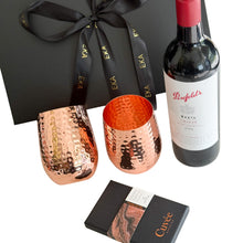 Load image into Gallery viewer, A luxury gift hamper featuring two hammered copper wine glasses, a bottle of Penfolds Max's Shiraz red wine, a Cuvée chocolate box
