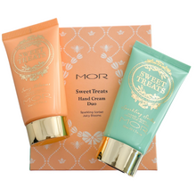 Load image into Gallery viewer, A set of two nourishing, scented hand creams that will leave your hands silky smooth. Enriched with a blend of shea butter, almond and macadamia oils.   Gift set contains:  Sparkling sorbet hand cream 50mL Juicy Blooms hand cream 50mL 
