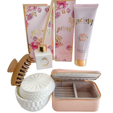 Load image into Gallery viewer, MOR Peony Blossom Hand and Nail Cream 125mL. A perfumed smoothing hand cream to keep you skin feeling smooth and silky soft  Cannister vanity to store valuables, trinkets or jewellery. Features removable lid. Measures 8.1cm length and 10cm width  MOR Peony Blossom petite reed diffuser 40mL  Small Treasures jewellery box. Features wrap around zip closure and open inner pocket to store valuables  Hair claw measuring 9.5cm (length), 4.5cm (width) 
